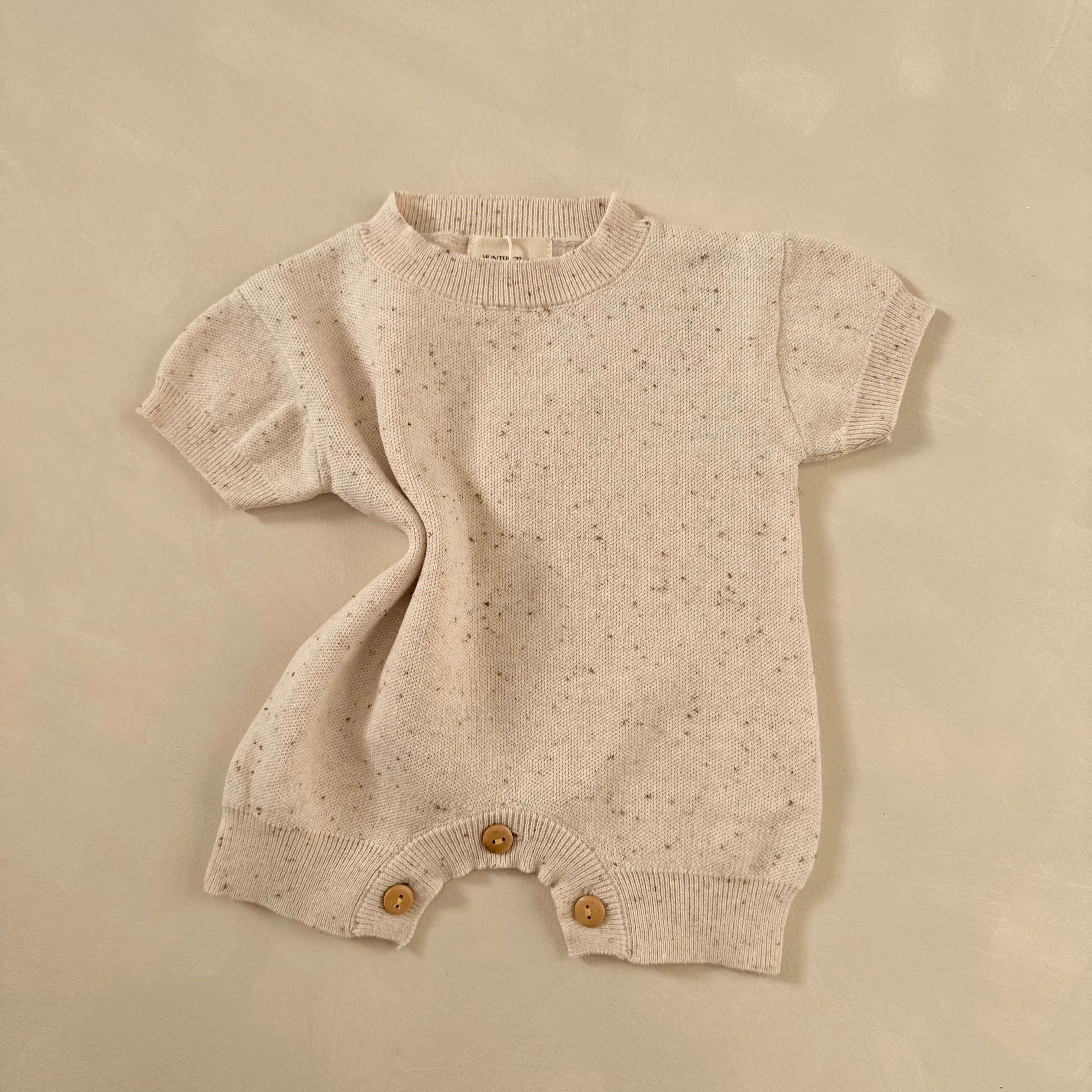 Rue Cocoa Flecked Cotton Knit Short Sleeve Baby Romper